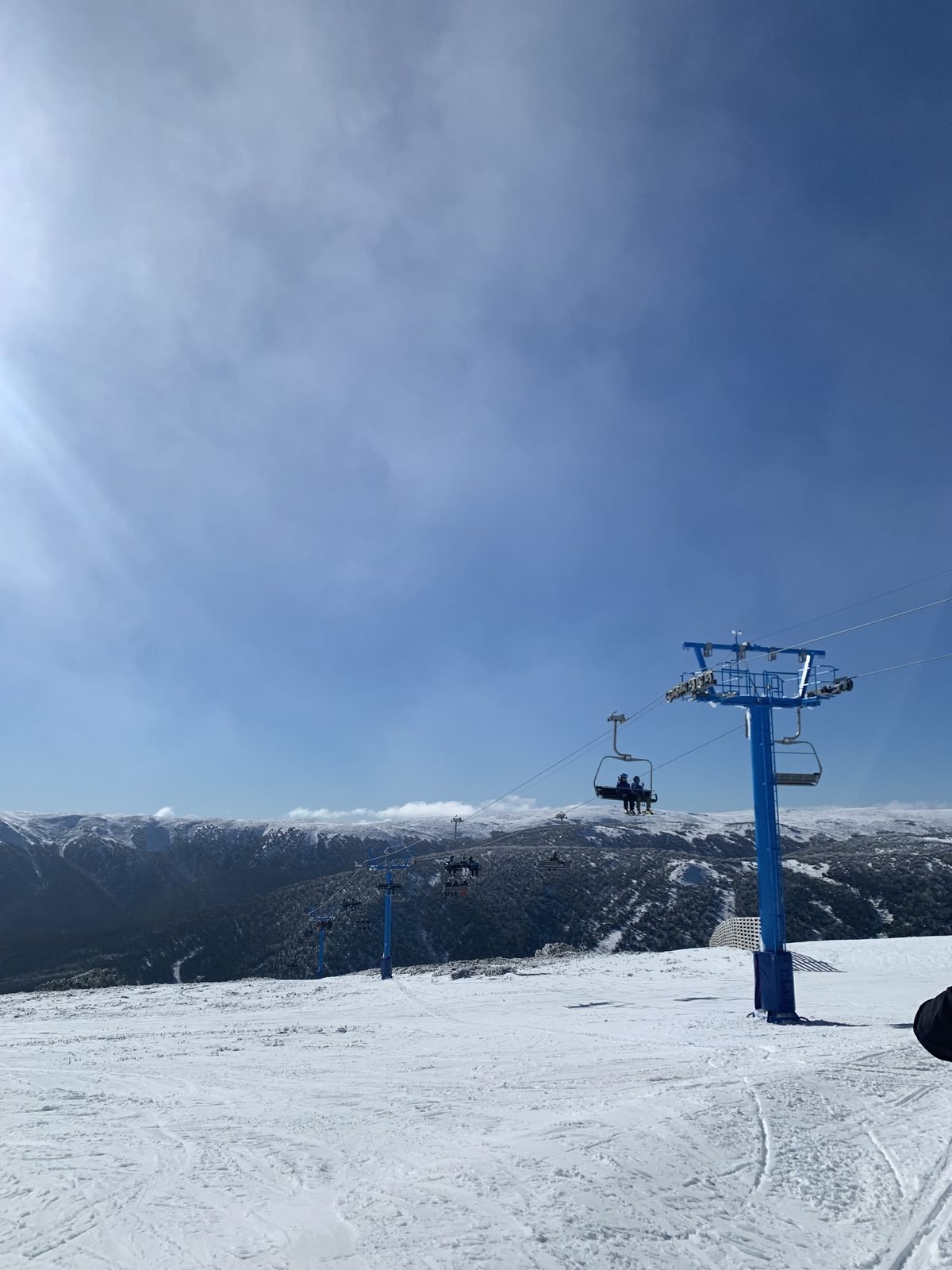 Chairlift and snow-covered slopes at Mount Buller Alpine Resort